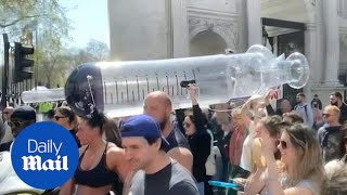 UK Covid19 Antilockdown and vaccine passport protesters march through London [upl. by Anton]