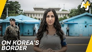 North Koreas dangerous border Inside the DMZ Pt1  AJ [upl. by Ayahc]